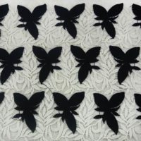 white and black embroideyr fabric