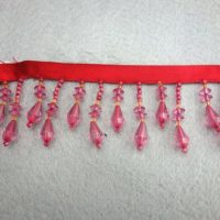 red ribbon with acrylic bead handmade fringe