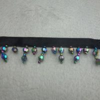 black ribbon with acrylic bead fringe