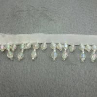 white ribbon with acrylic bead fringe
