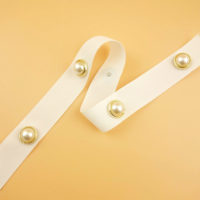ribbon with pearl stud